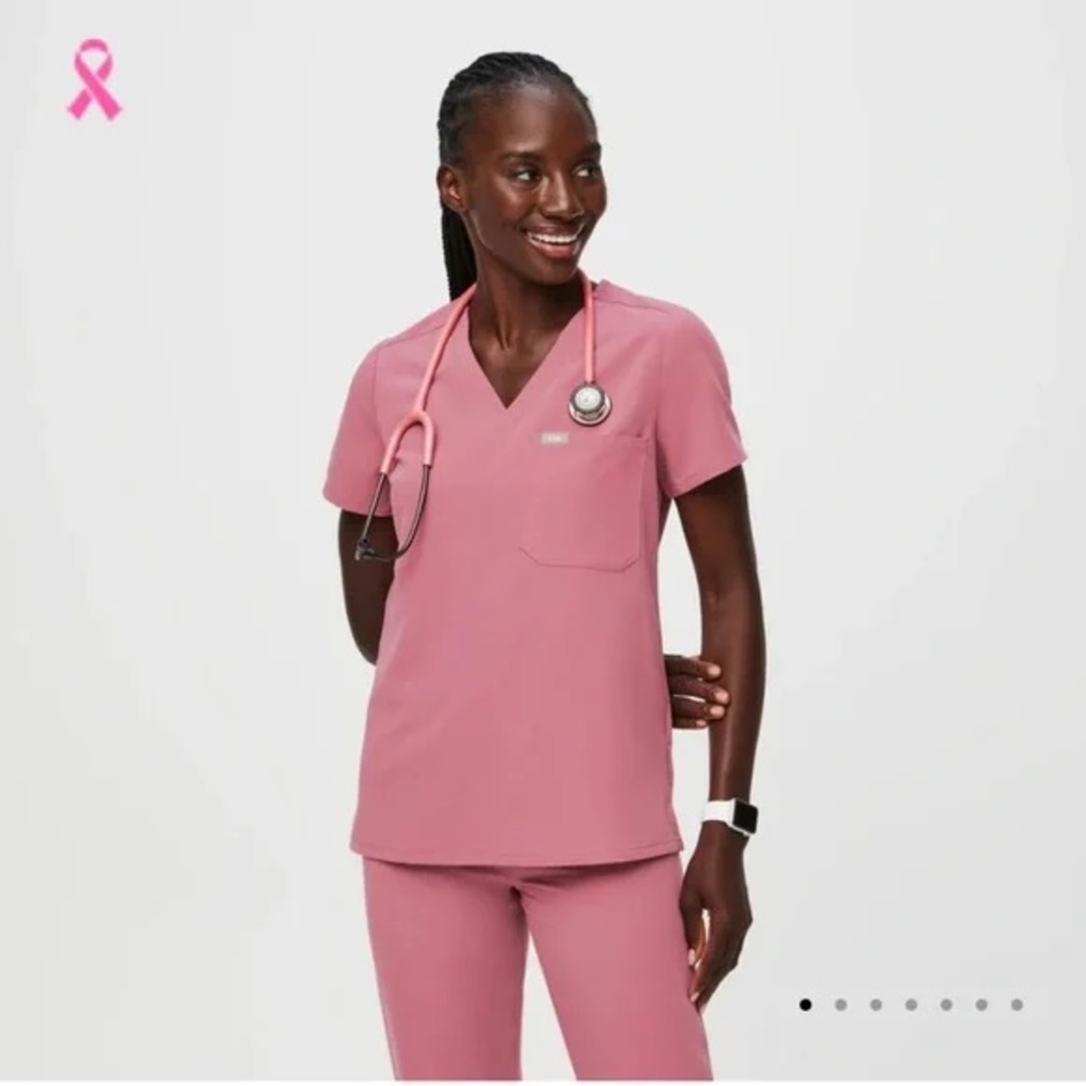 Chalk pink FIGS scrub top xx-small, never worn like new condition.
